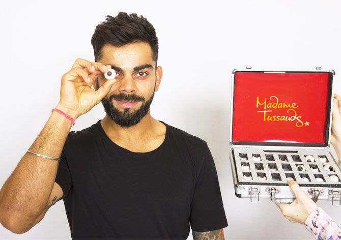 Virat Kohli during a sitting session with artists from Madame Tussauds on Wednesday