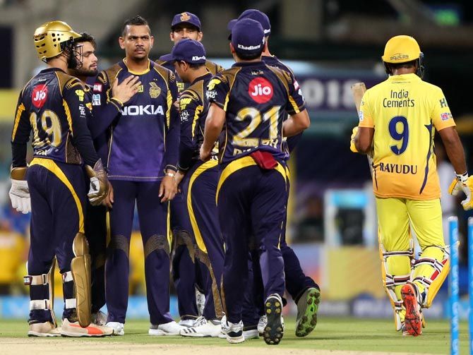 Sunil Narine is congratulated by his KKR teammates after dismissing Shane Watson