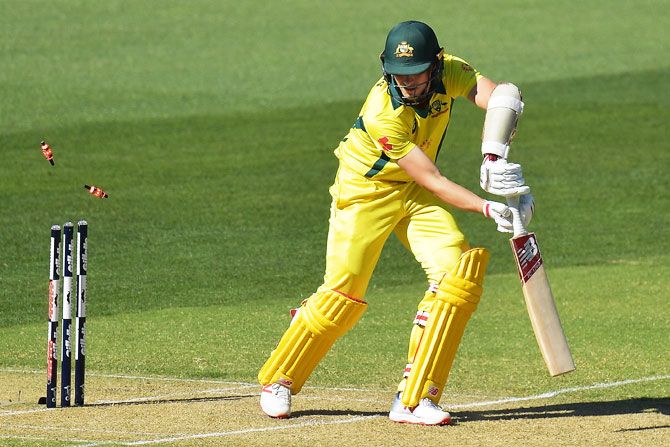 Australia's Pat Cummins is bowled by South Africa's Dale Steyn