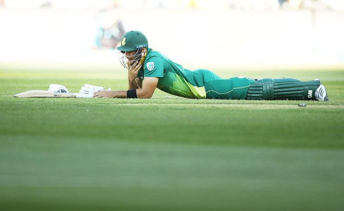 South Africa's Aiden Markram wears a dejected look after being run out by Australia's Marcus Stoinis