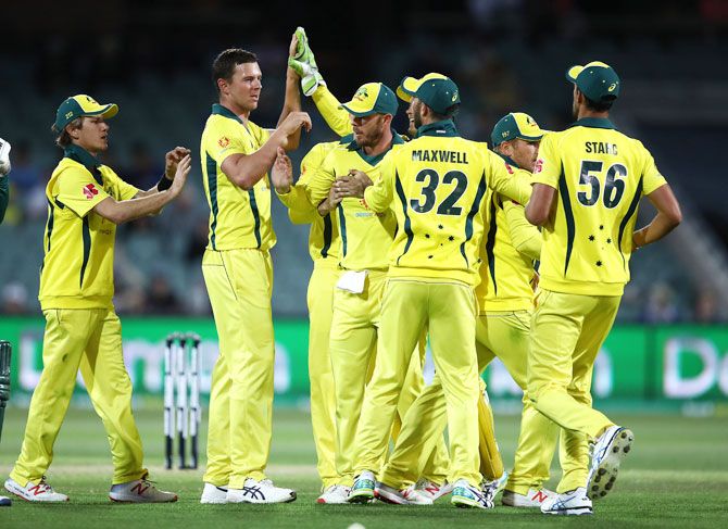 Australia's Josh Hazlewood celebrates with teammates after taking the wicket of South Africa's Dwaine Pretorius during the 2nd match of the Gillette One Day International series at Adelaide Oval in Adelaide on Friday
