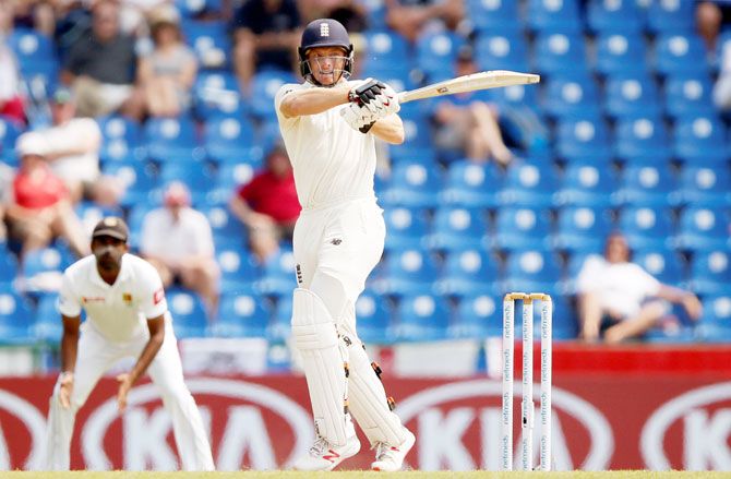 England's Jos Buttler hits a boundary during the 2nd Test against Sri Lanka in Pallekele on Wednesday