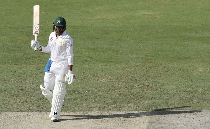 Pakistan's Haris Sohail celebrates after reaching his century on Day 2 of the first Test against Australia at Dubai International Stadium in Dubai, United Arab Emirates, on Monday