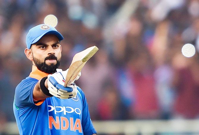 Virat Kohli acknowledges the applause from the crowd after registering his 37 ODI century on Wednesday