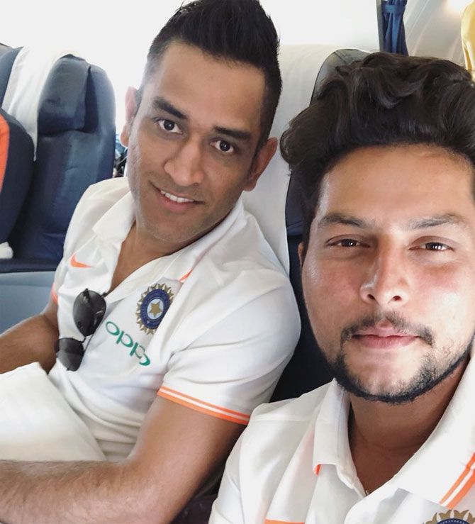 Mahendra Singh Dhoni and Kuldeep Yadav click a selfie aboard a flight en route Dubai on Thursday