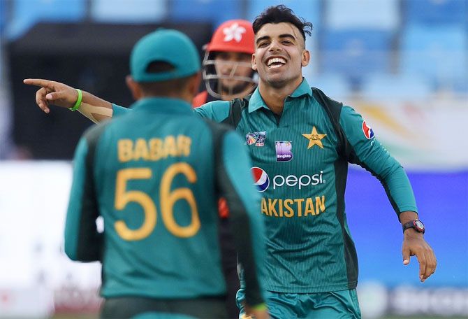 Pakistan's Shadab Khan celebrates a wicket against Hong Kong during their Asia Cup match in Dubai on Sunday