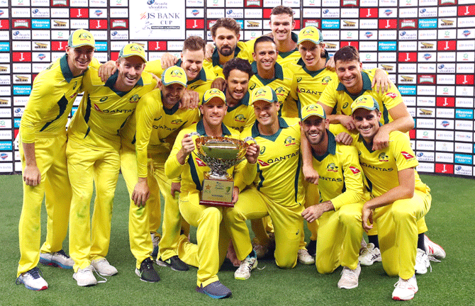 Australia celebrate with the trophy on winning the One Day International series 5-0 against Pakistan at Dubai International Stadium in Dubai on Sunday