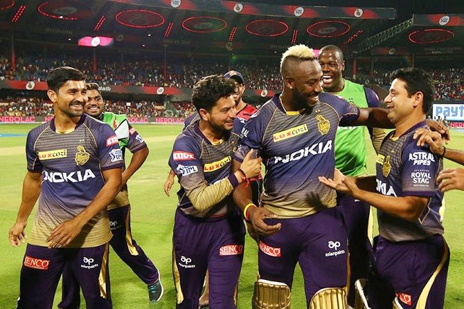 Kolkata Knight Riders players applaud Andre Russell after his match-winning knock against Royal Challengers Bangalore