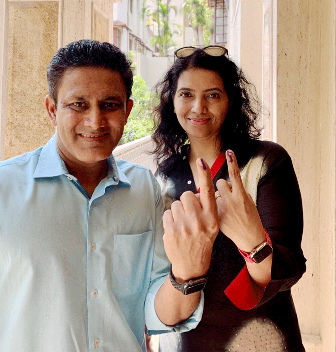 Anil Kumble and his wife Chethana after voting on Thursday