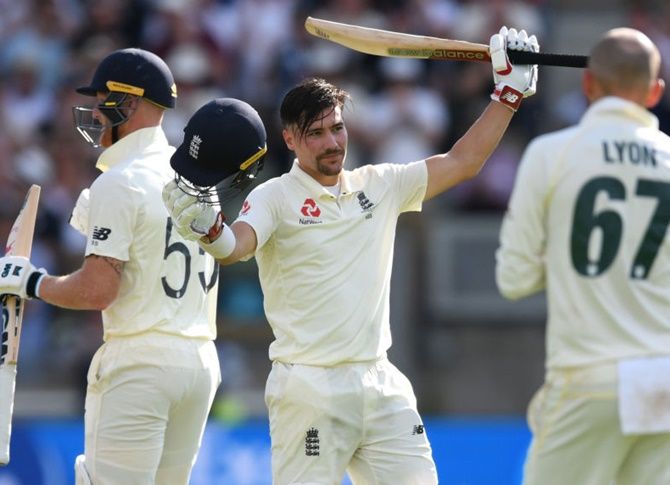 Australia's Steve Smith takes a catch to dismiss England's Jason Roy off the bowling of James Pattinson
