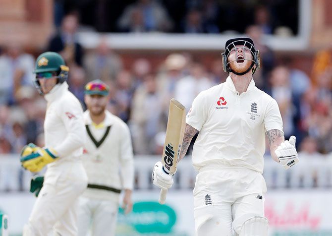 England's Ben Stokes celebrates after reaching his century on Day 5 of the 2nd Ashes Test between against Australia at Lord's Cricket Ground in London on Sunday