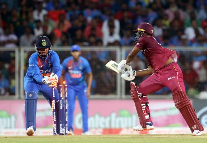 Evin Lewis is stumped out by Rishabh Pant for 40