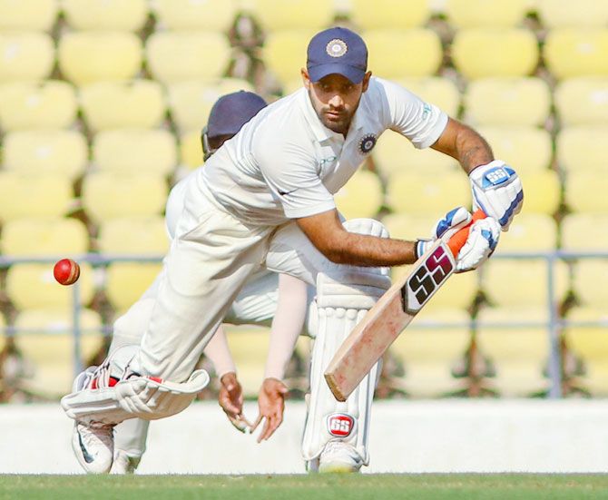 Rest of India batsman Hanuma Vihari plays a shot to complete his century against Vidarbha during the Irani Cup cricket match at VCA Stadium in Nagpur on Tuesday