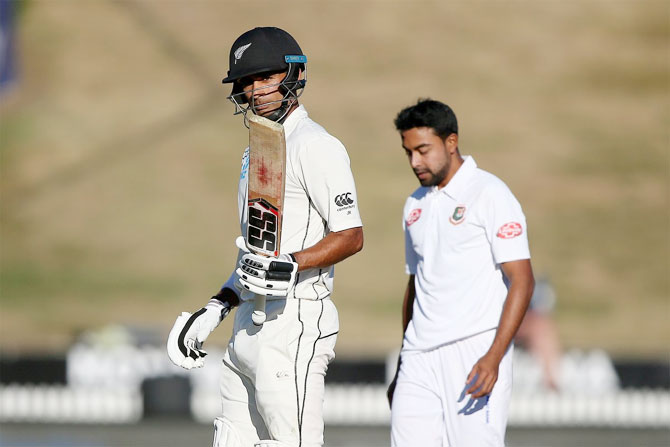 New Zealand's Jeet Raval celebrates on scoring his half-century against Bangladesh on Thursday