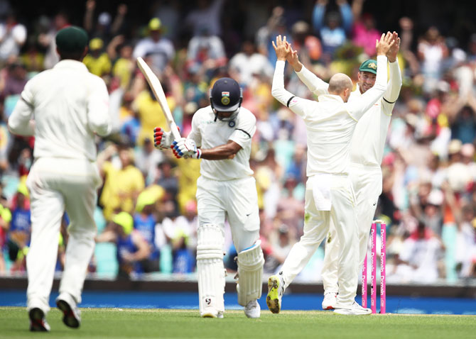 Australia's Nathan Lyon celebrates after dismissing India's Mayank Agarwal on Day 1 of the 4th Test match at Sydney Cricket Ground in Sydney, Australia, on Thursday