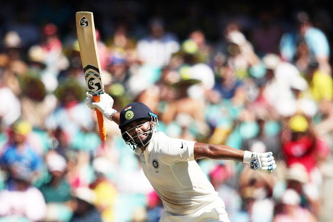India's Rishabh Pant celebrates scoring a century against Australia on Day 2 of the 4th Test match at Sydney Cricket Ground in Sydney on Friday