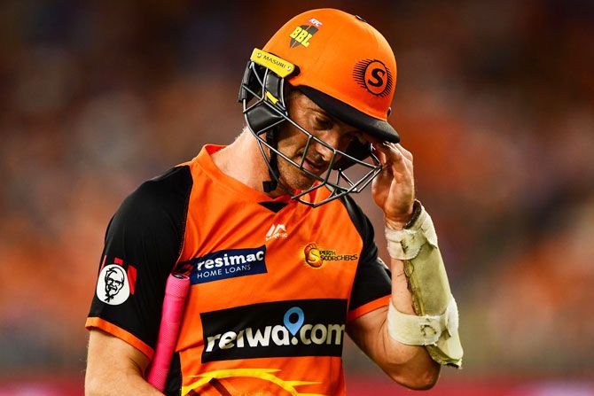 Perth Scorchers' Michael Klinger leaves the field after his dismissal during the Big Bash League match against Sydney Sixers at Optus Stadium in Perth, Australia, on Sunday