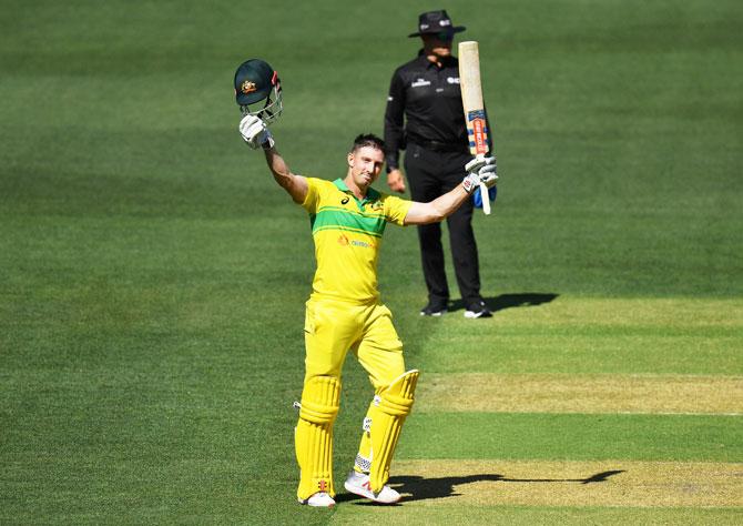 Australia's Shaun Marsh celebrates on completing his century during the 2nd ODI against India at Adelaide Oval