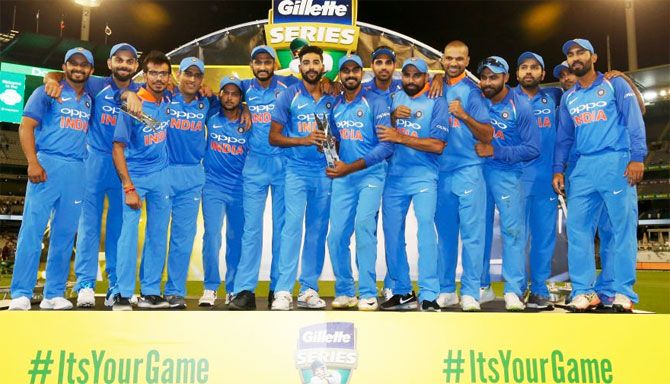 Team India celebrate with the trophy after winning the ODI series 2-1 in Melbourne on Friday