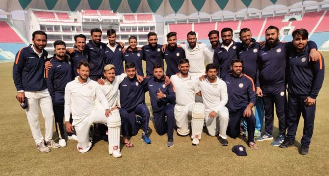 The jubilant Saurashtra cricket team after their victory on Saturday