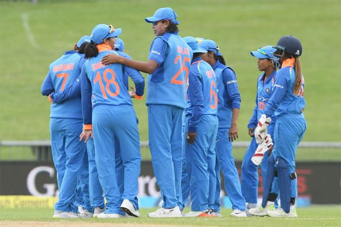 Indiia women celebrate the fall of a New Zealand wicket