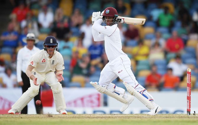 West Indies' Shimron Hetmyer plays a shot as England's Keaton Jennings looks on. Hetmeyer's rear guard with Shane Dowrich helped steady hosts in 2nd innings