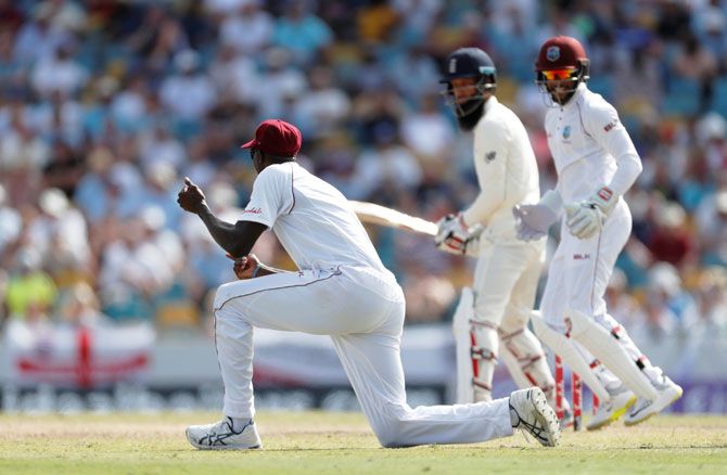 West Indies' Jason Holder takes the catch to dismiss England's Moeen Ali