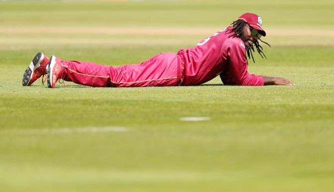 Chris Gayle reacts after missing a catch.