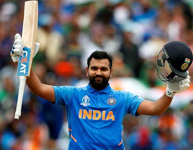 Rohit Sharma celebrates scoring a hundred against Bangladesh in the World Cup
