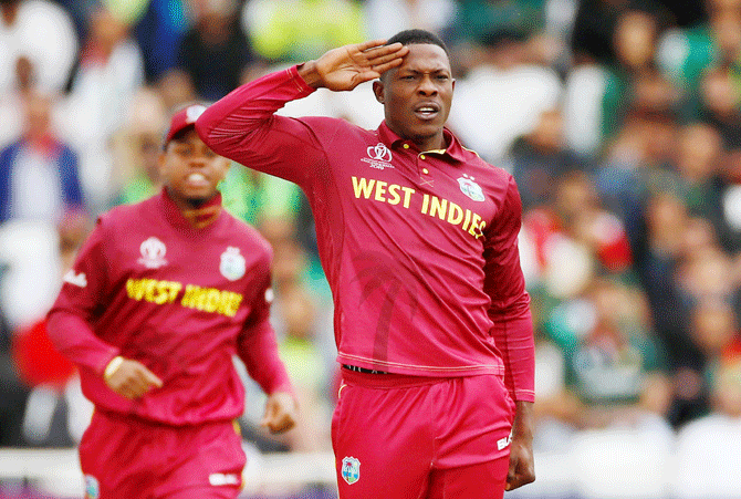 West Indies' Sheldon Cottrell celebrates taking the wicket of Pakistan's Imam-ul-Haq during their match at Trent Bridge, Nottingham on May 31
