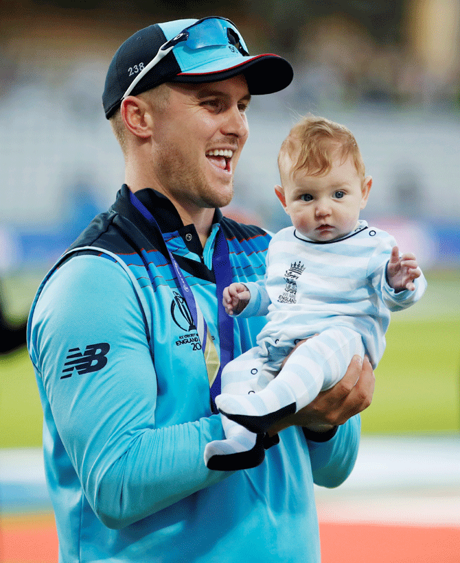 England's Jason Roy with his baby