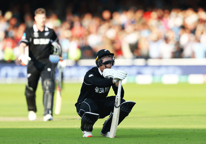 New Zealand's Martin Guptill reacts as he is run out by Jos Buttler on the final ball of the Super Over during the ICC Cricket World Cup final between New Zealand and England at Lord's Cricket Ground in London on Sunday