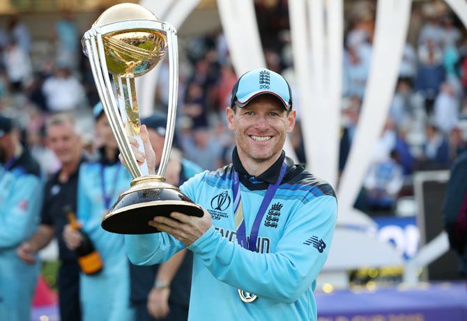 England's Eoin Morgan celebrates with the trophy after winning the world cup on July 14