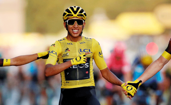 Team INEOS rider Egan Bernal of Colombia celebrates at the finish after riding the 128-km Stage 21 from Rambouillet to Paris Champs-Elysees to win the Tour de France title on Sunday Also the winner of the white jersey for the best Under-25 rider, Bernal did not win a single stage, but he was first at the top of the Col de l’Iseran when the decisive 19th stage was stopped because of hailstorms and landslides in the Alps.