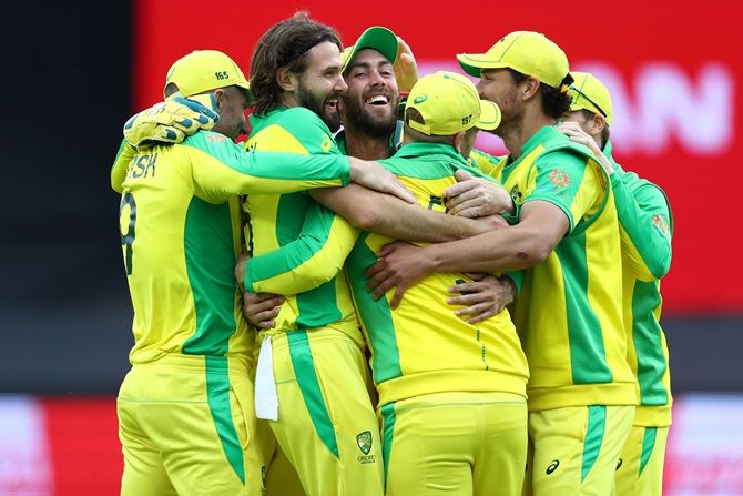 Australia's players celebrate victory over Pakistan