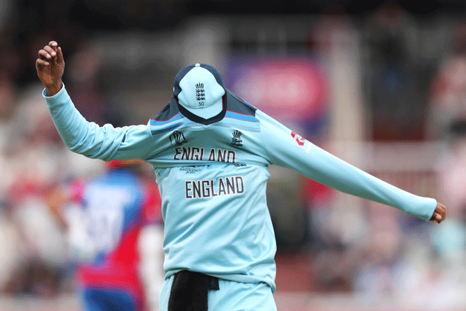 Is that a scarecrow on the cricket field? Hang on... that's Adil Rashid! 