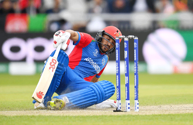 Afghanistan captain and opener Gulbadin Naib slips whilst running. He made a quick-fire 37 off 28 before perishing
