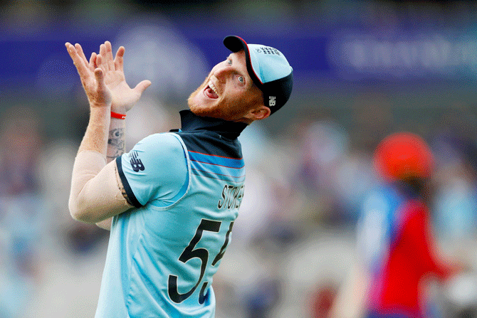 Ben Stokes clowns around, taking a mock catch during their match against Afghanistan