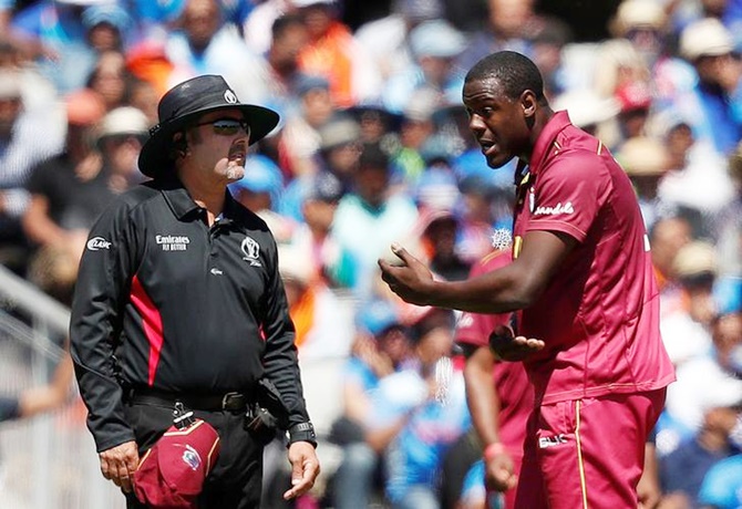 West Indies' Carlos Brathwaite remonstrates with Richard Illingworth during Thursday's World Cup match against India.