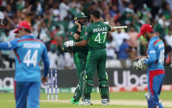  Imad Wasim and Wahab Riaz celebrate after guiding Pakistan to victory over Afghanistan in Saturday's World Cup match at Headingley