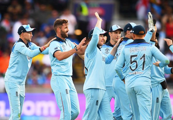 England's Liam Plunkett celebrates with teammates after dismissing India's Hardik Pandya  during their ICC World Cup group stage match at Edgbaston in Birmingham on Sunday