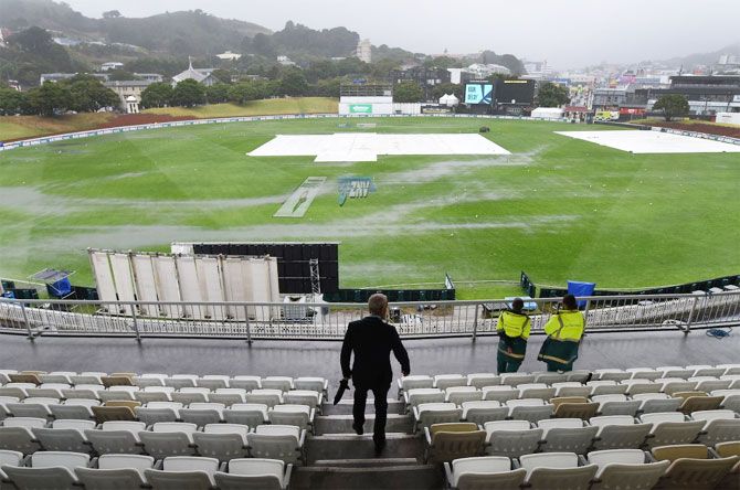 The covers laid on the pitch at the Basin Reserve in Wellington on Friday