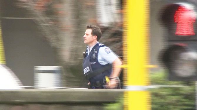 A police officer is seen after reports that several shots had been fired at a mosque, in central Christchurch, New Zealand March 15, 2019, in this still image taken from video