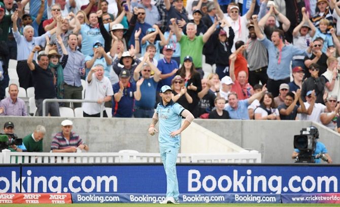 Ben Stokes reacts after taking the catch of Andile Phehlukwayo