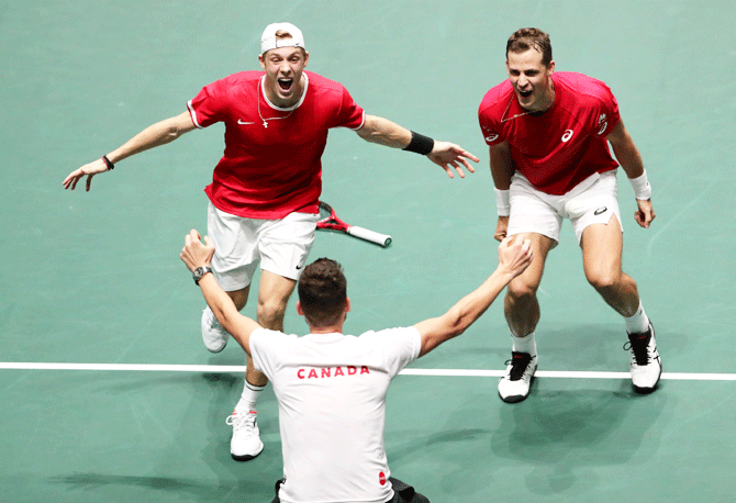 Canada's Denis Shapovalov and Vasek Pospisil celebrate after winning their doubles match against Australia's John Peers and Jordan Thompson during their Davis Cup match at Caja Magica, Madrid on Thursday