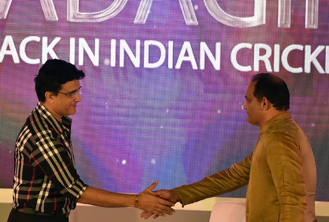 Sourav Ganguly and Mohammad Azharuddin exchange pleasantries