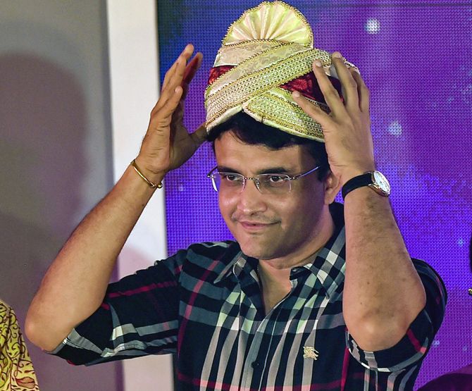 BCCI president Sourav Ganguly adjusts his crown during the felicitation function at Eden Gardens, in Kolkata on Friday.