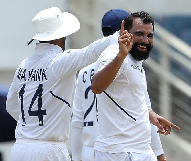 Mohammed Shami celebrates after taking out Rahkeem Cornwall