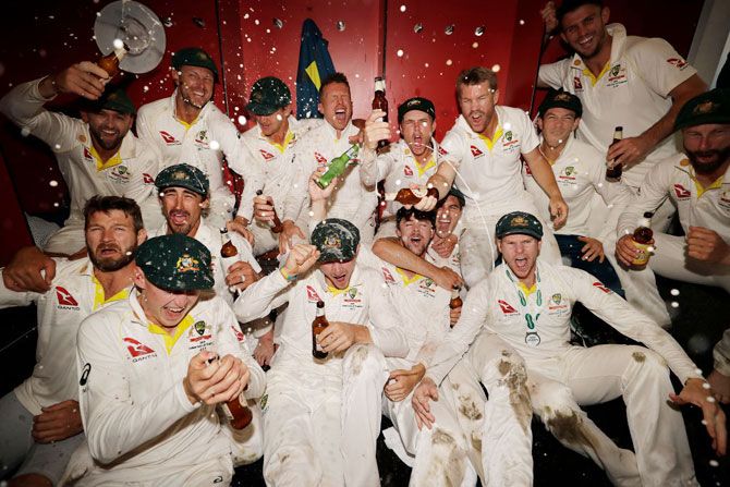 The Australian Cricket Team celebrate in the change rooms after Australia claimed victory to retain the Ashes during day five of the 4th Test at Old Trafford in Manchester on Sunday