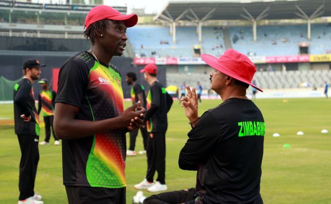 Zimbabwe coach Lalchand Rajput speaks with bowler Chris Mpofu in this file photo during the recent tour of Bangladesh